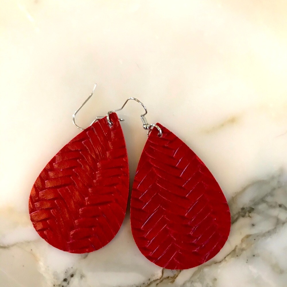 Faux red leather earrings.